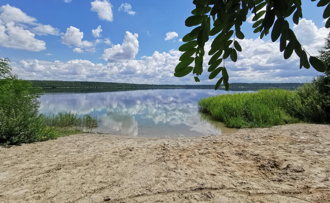 Фото Hasselbacher See Strand с светлый песок поверхностью