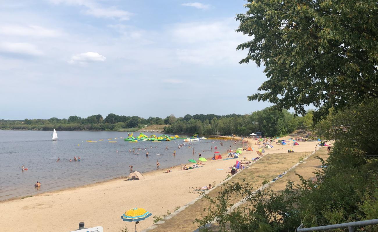 Фото Badestrand Grosskoschen с светлый песок поверхностью