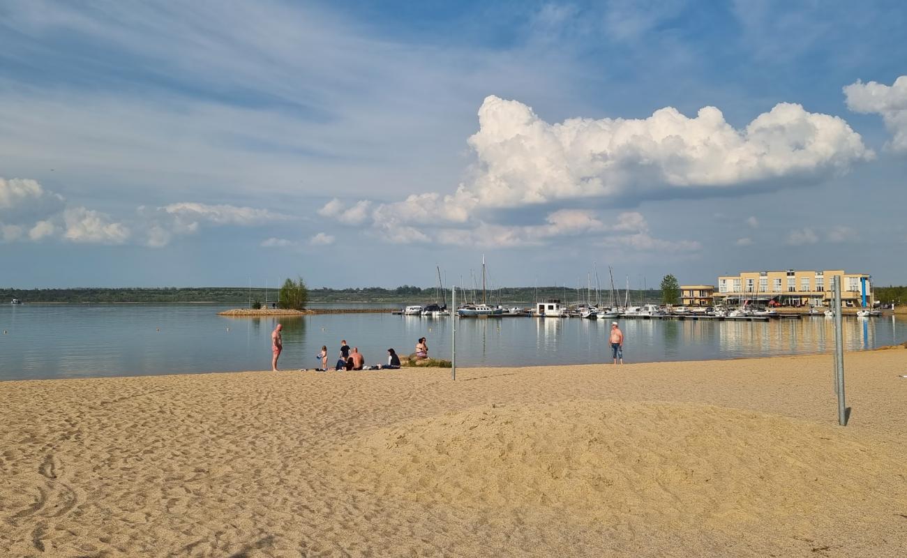 Фото Liegestrand Lagovida с светлый песок поверхностью