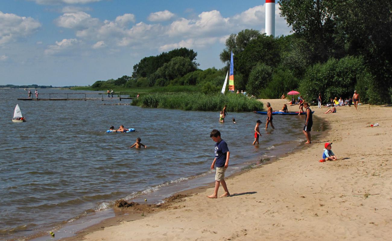 Фото Kollmar strand с светлый песок поверхностью