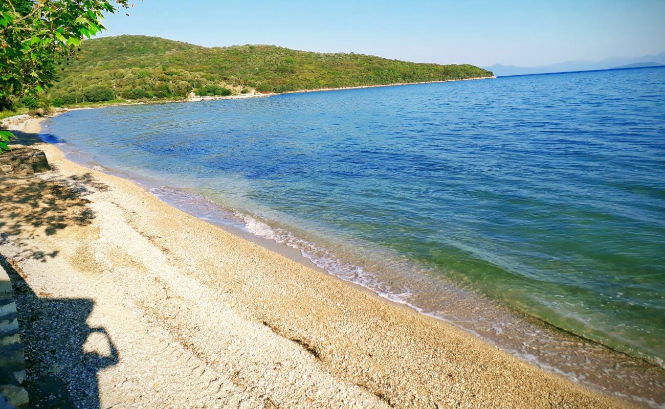 Фото Porticciolo beach с серая галька поверхностью