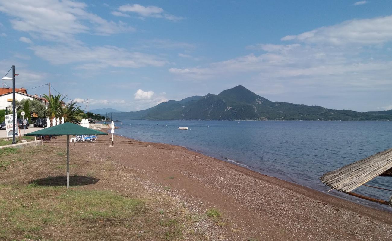 Фото Achladi beach с песок с галькой поверхностью