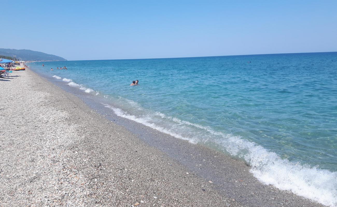 Фото Agiokampos beach с светлый песок поверхностью