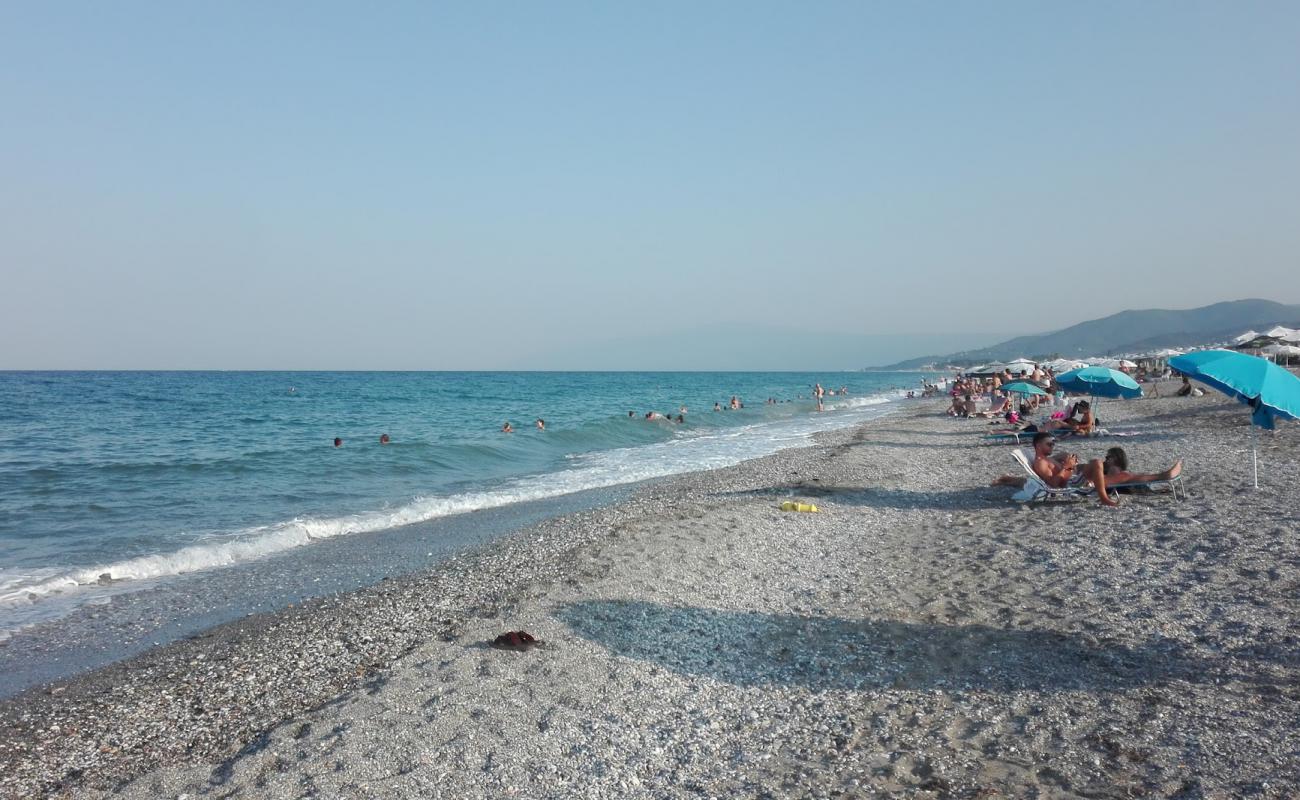 Фото Larissas Beach с светлый песок поверхностью