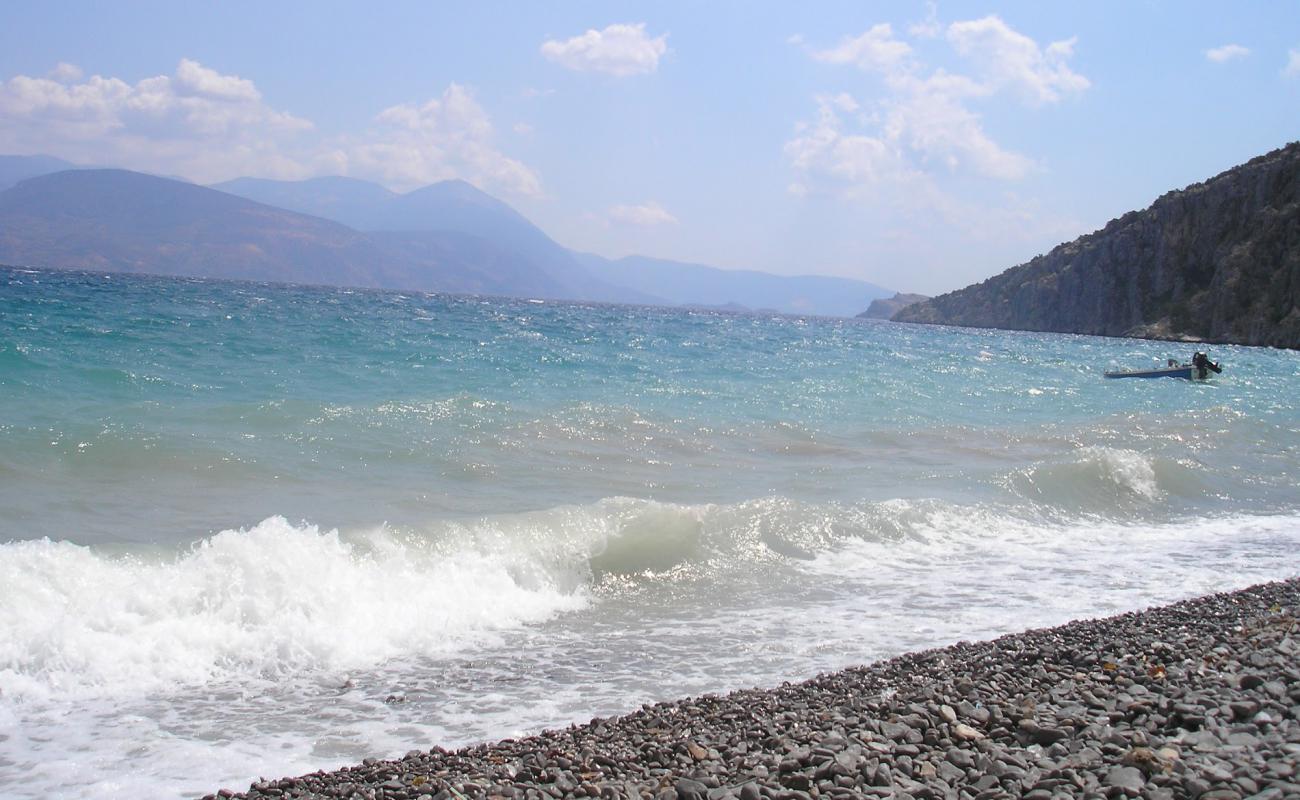 Фото Prosakos beach с светлая галька поверхностью