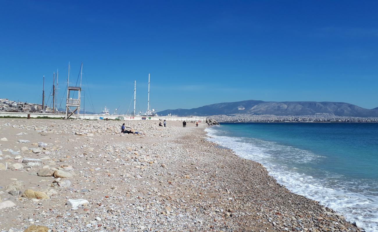 Фото Beach Freatida с песок с камнями поверхностью