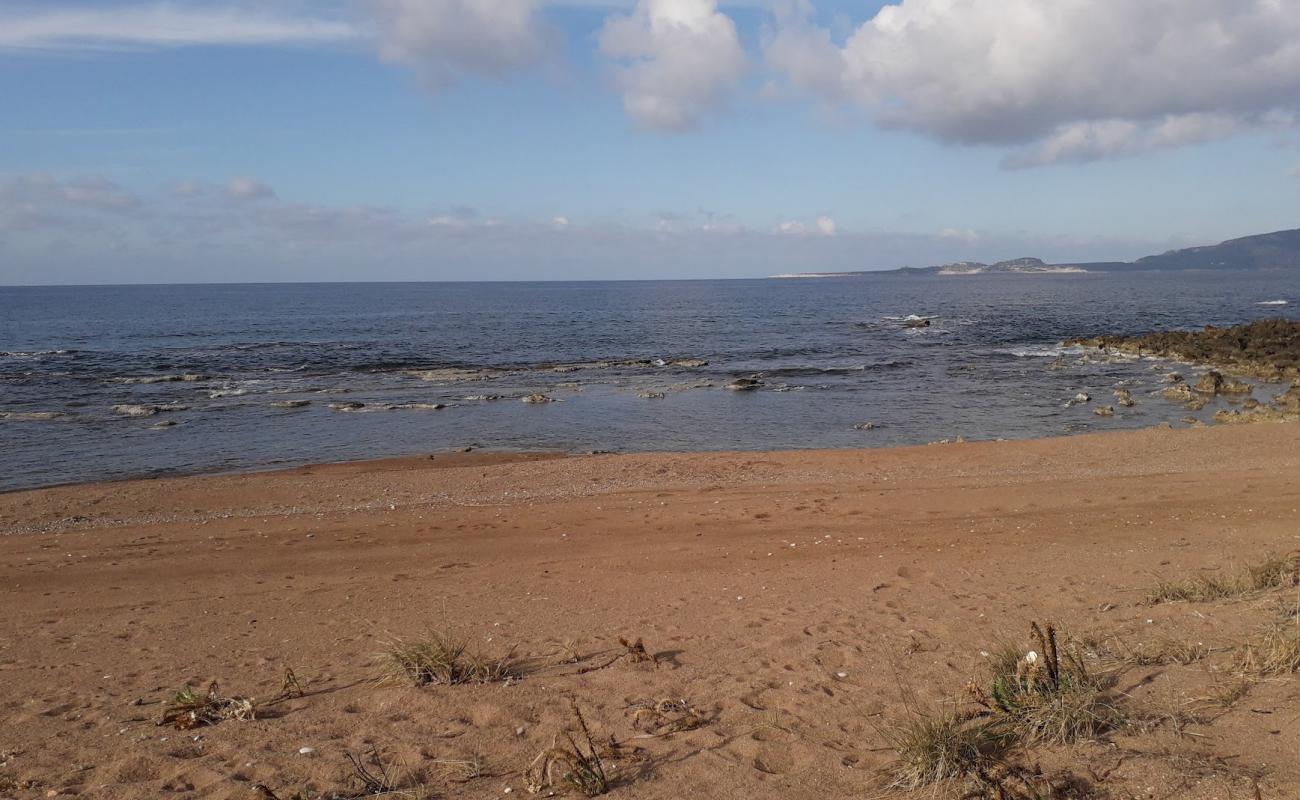 Фото Pigadia beach с светлый песок поверхностью