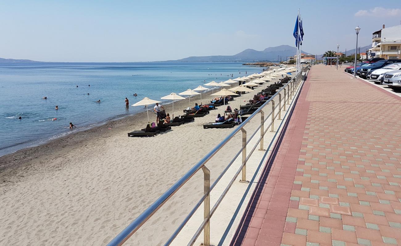 Фото Neapolis beach с светлый песок поверхностью