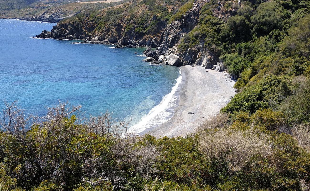 Фото Agios Georgios beach с серая галька поверхностью