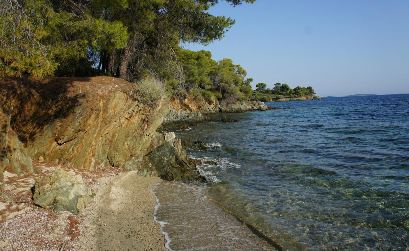 Фото Agios Kyriaki beach IV с песок с галькой поверхностью