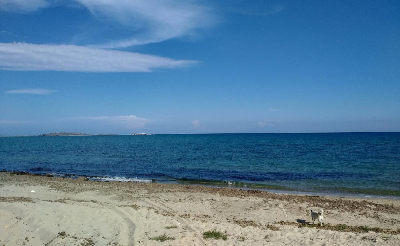 Фото Glyfada beach с светлый песок поверхностью