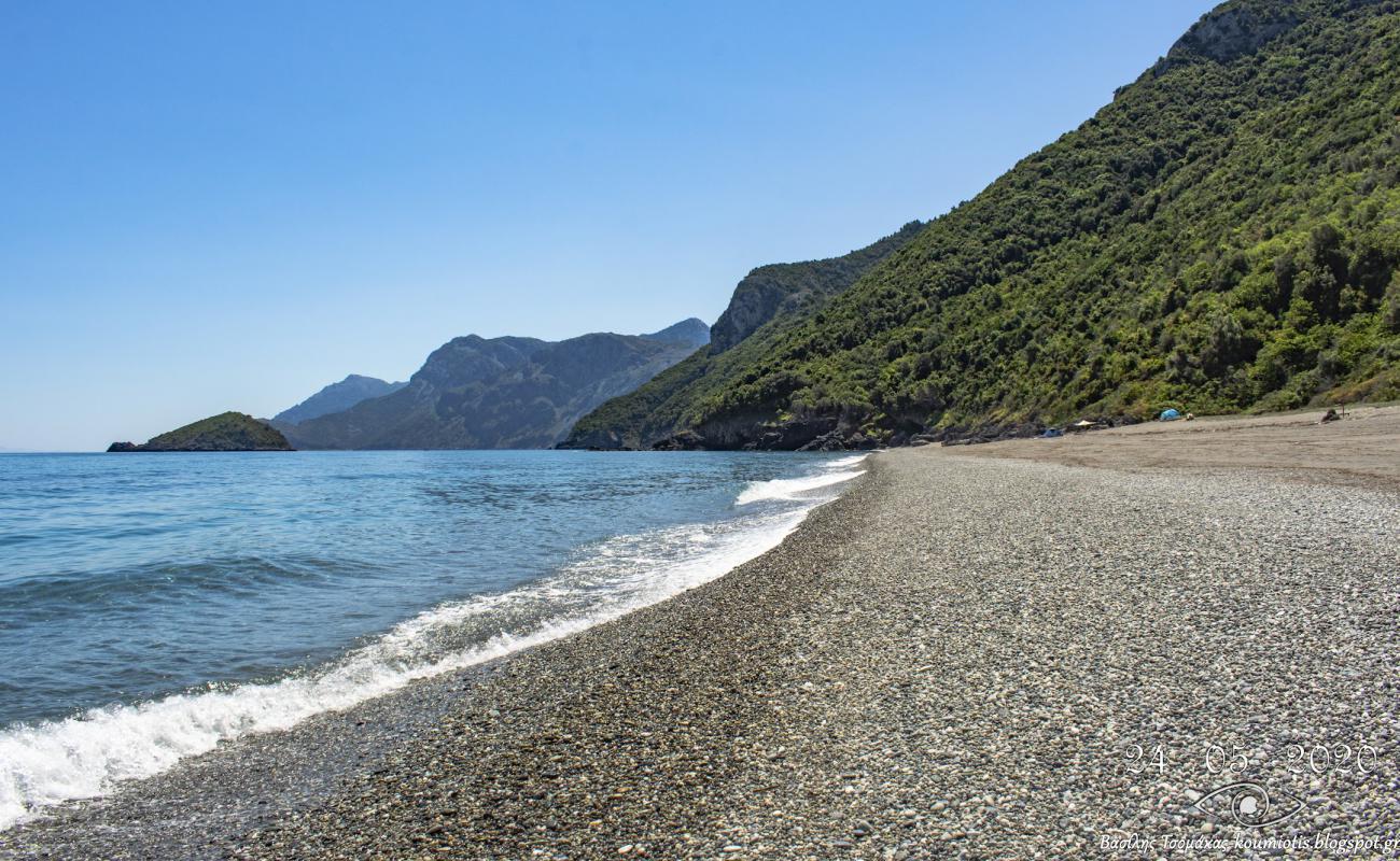 Фото Charalambu beach с серая чистая галька поверхностью