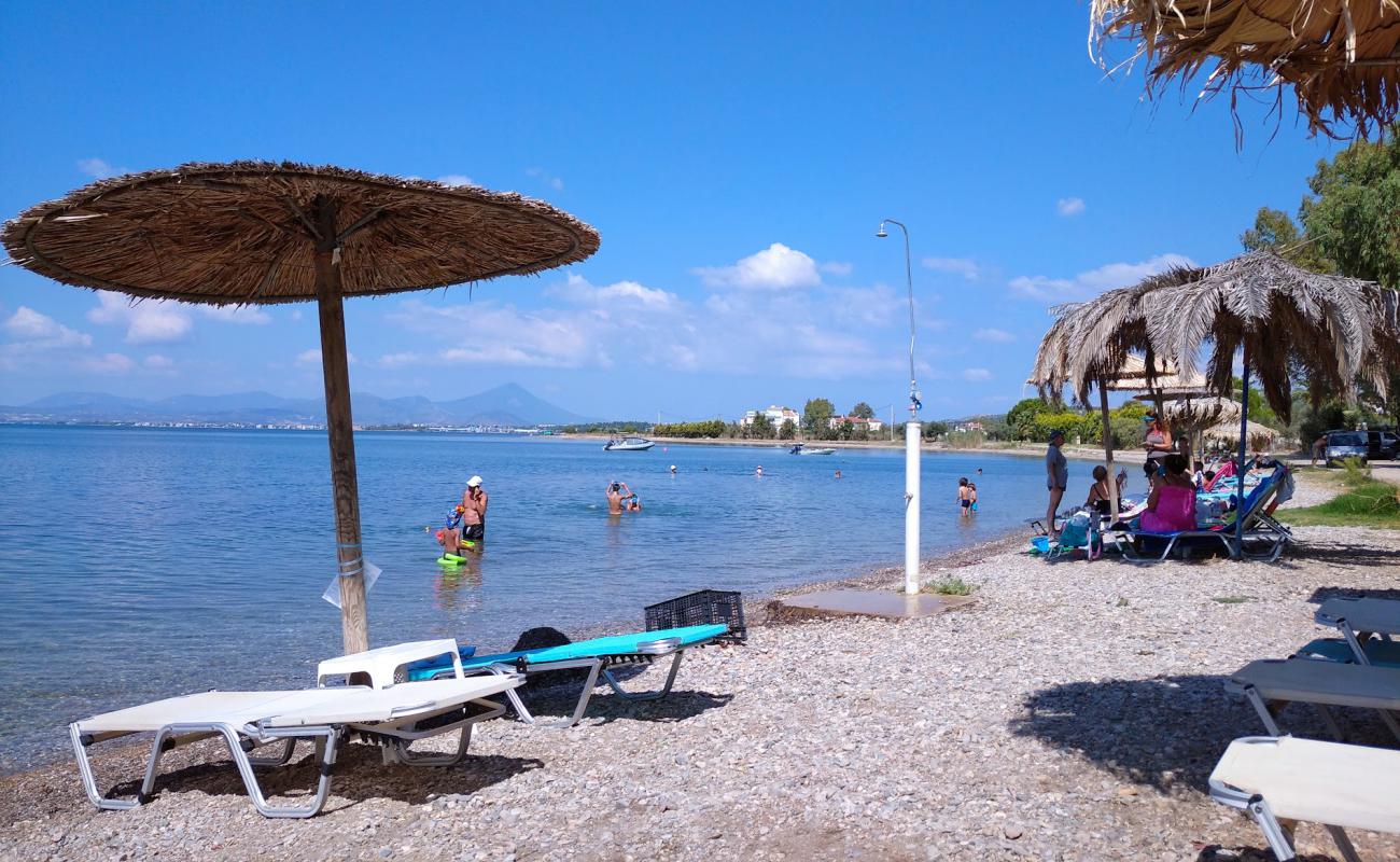 Фото Agios Andreas beach с песок с галькой поверхностью