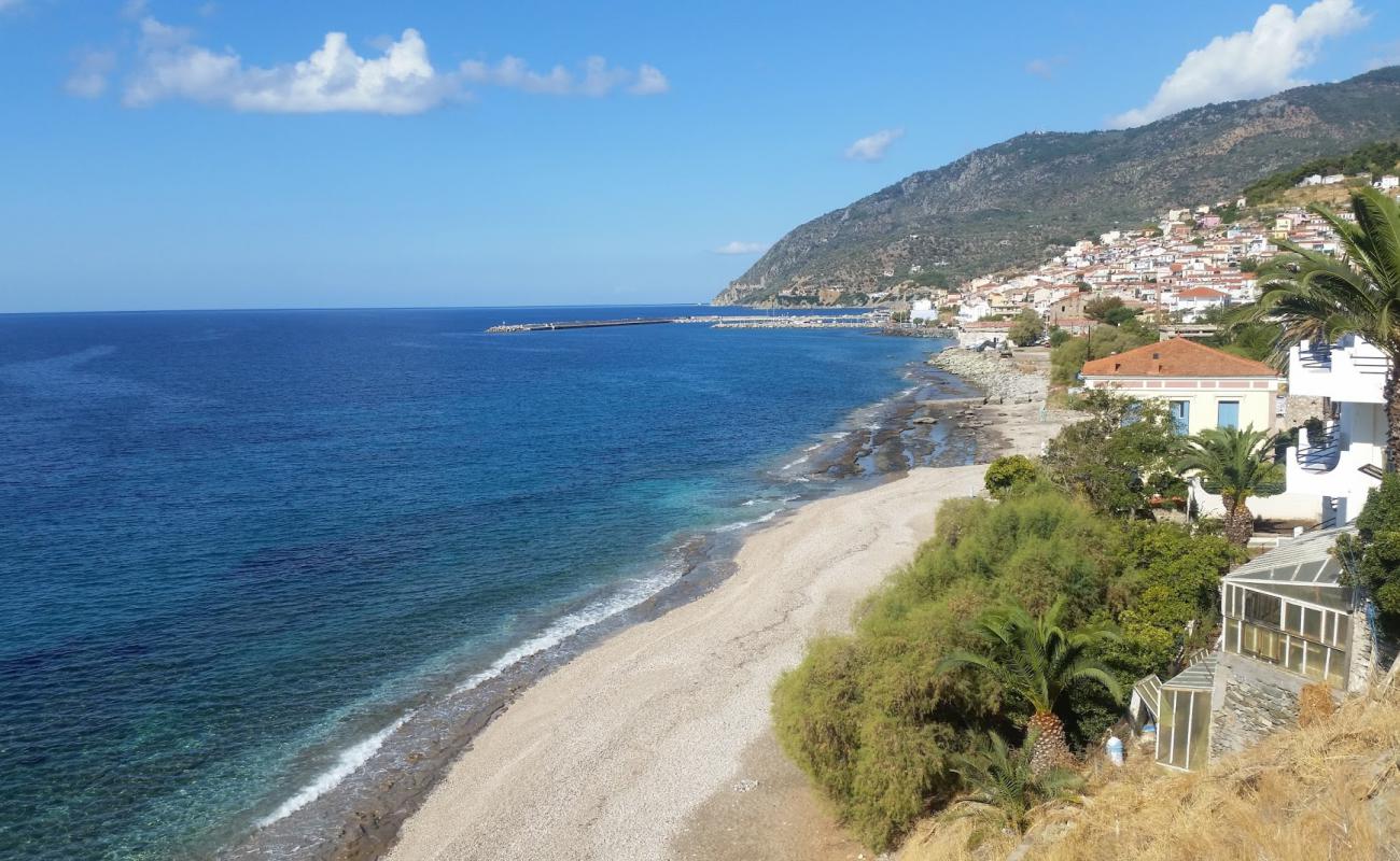 Фото Plomari beach Saint Isidoros с светлая галька поверхностью