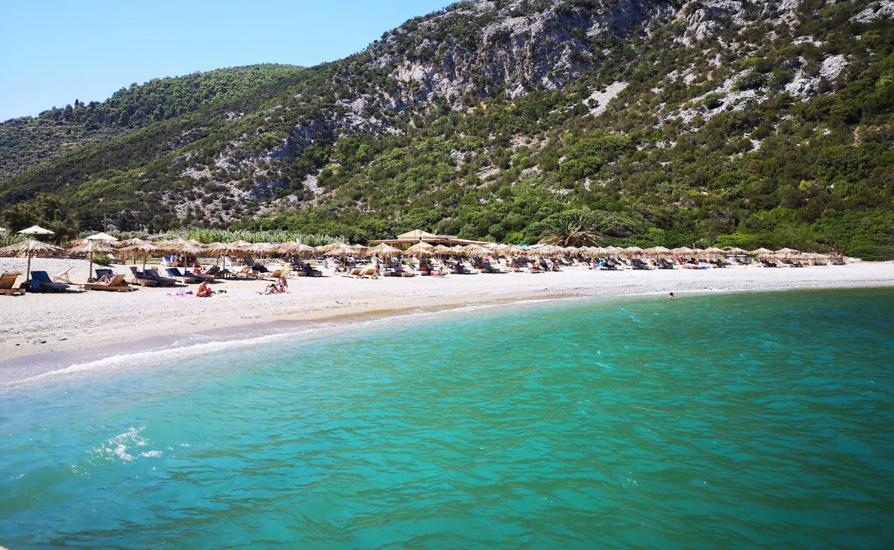 Фото Glysteri beach с серая галька поверхностью