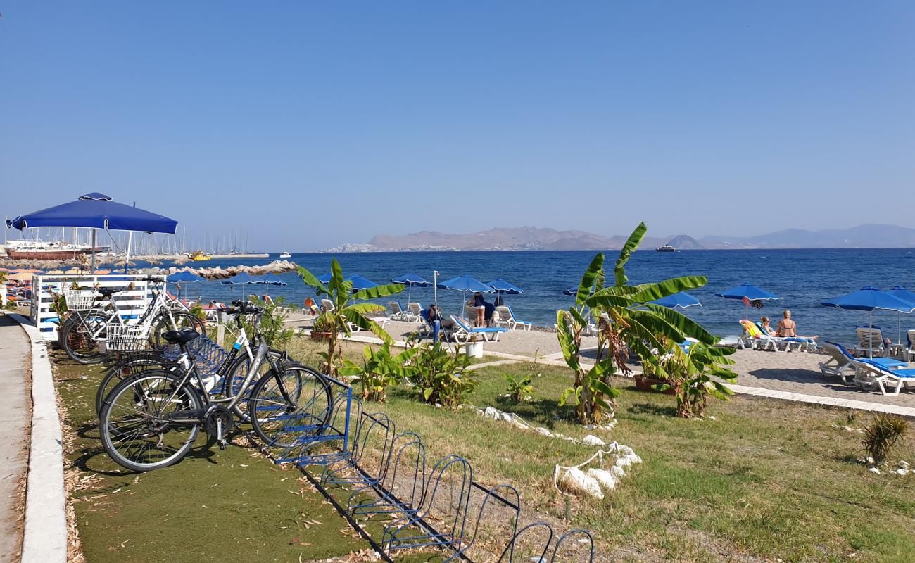 Фото Paradiso Beach с светлый песок поверхностью