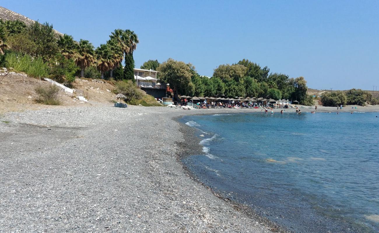 Фото Agios Fokas Beach с песок с галькой поверхностью