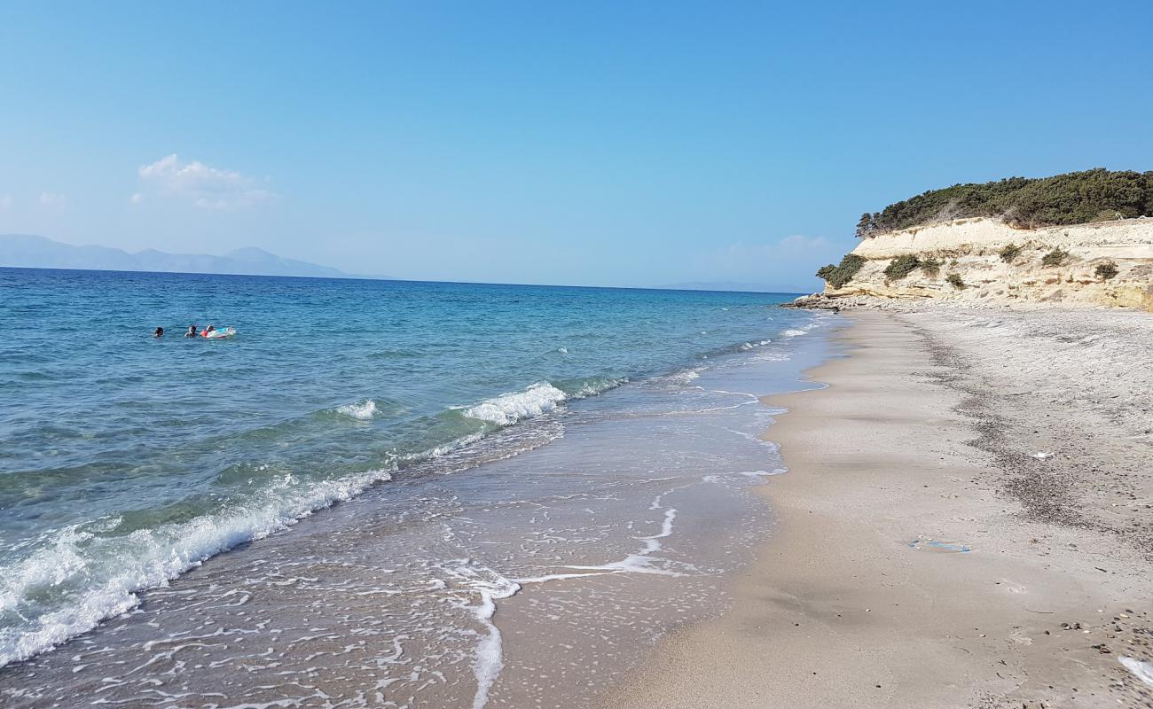 Фото Lakos beach с серый песок поверхностью