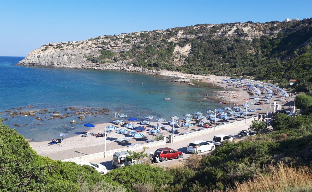 Фото Mandomata Beach с песок с камнями поверхностью