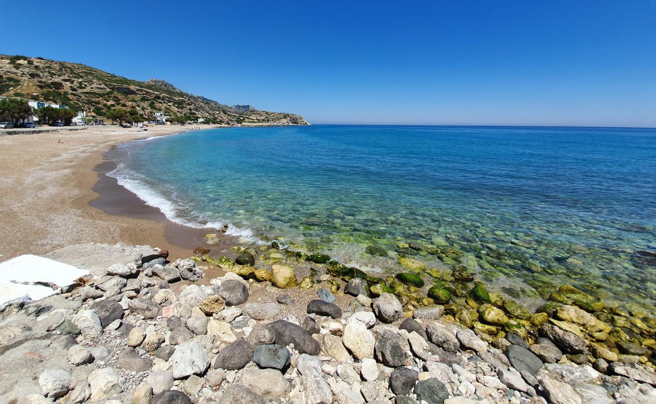 Фото Stegna beach с песок с галькой поверхностью