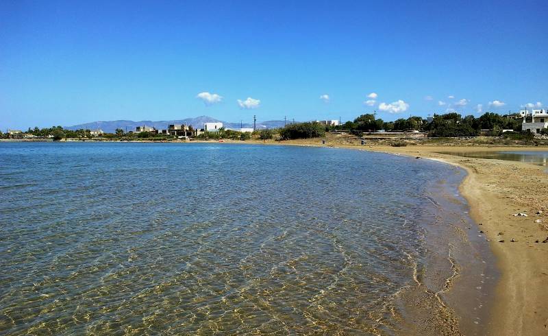 Фото Plage Stefano с золотистый песок поверхностью