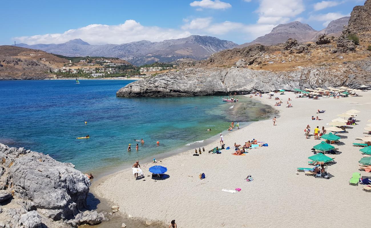 Фото Ammoudi beach с белая чистая галька поверхностью