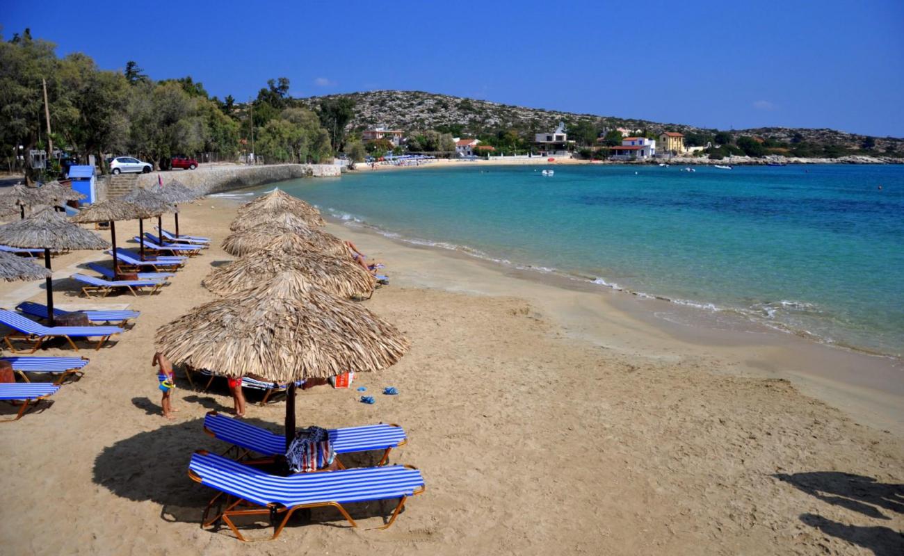 Фото Marathi Beach с светлый песок поверхностью