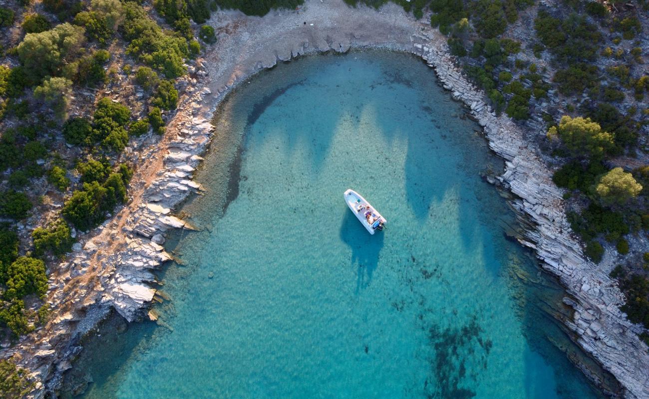 Фото Pisina beach с камни поверхностью