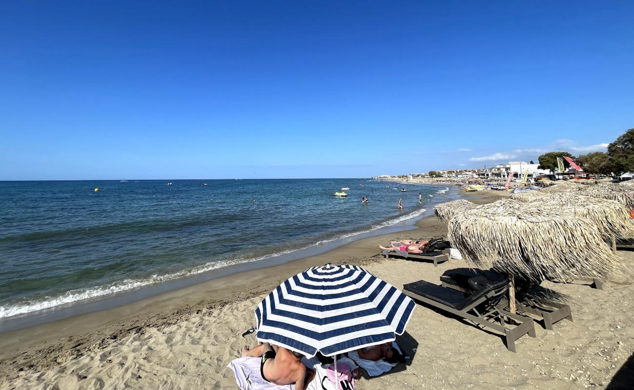 Фото Analipsi Beach с светлый песок поверхностью