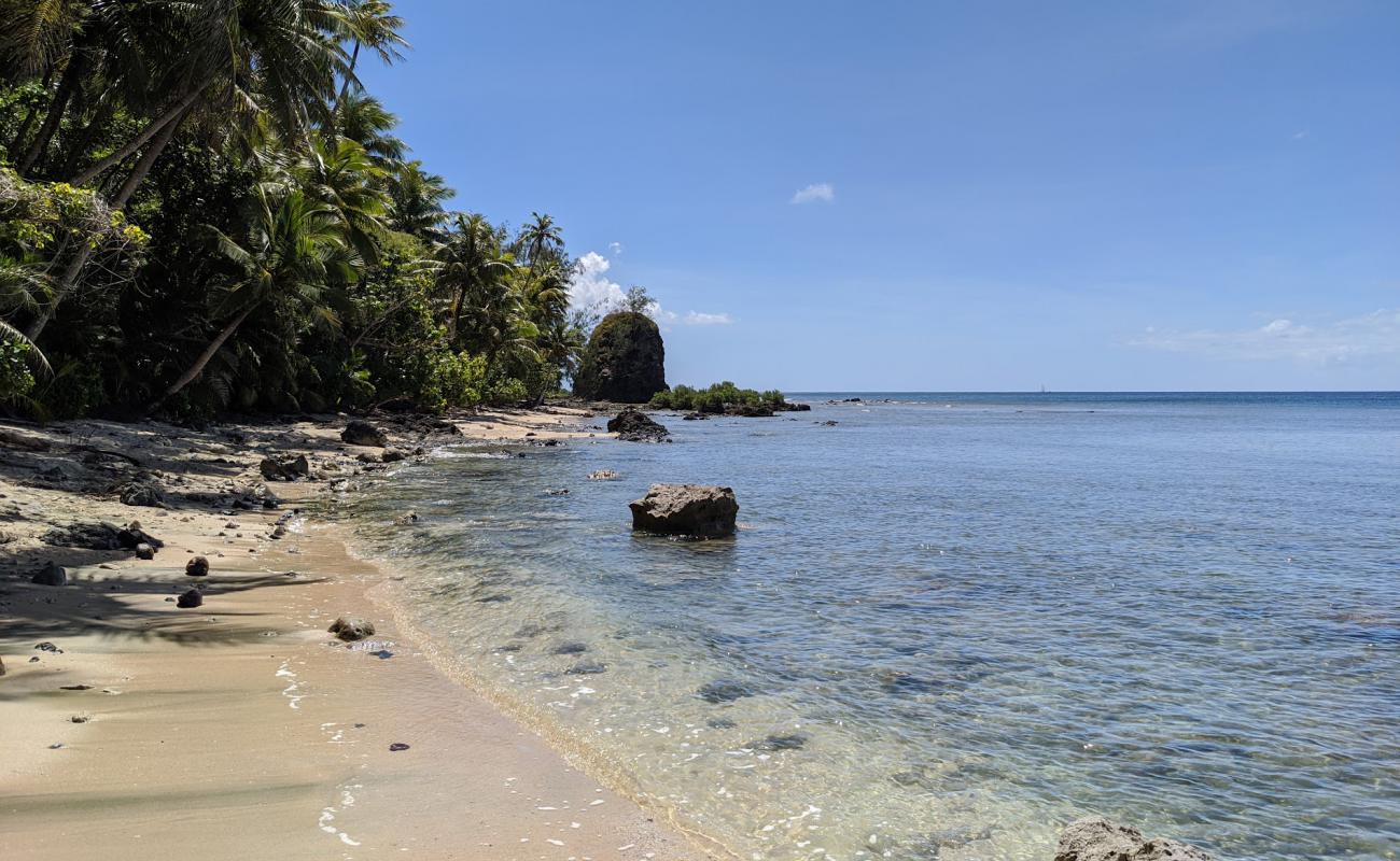 Фото Sella Bay с песок с камнями поверхностью