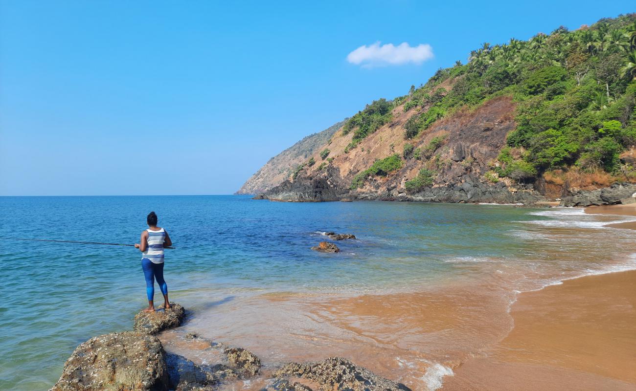 Фото Kakolem Beach с светлый песок поверхностью