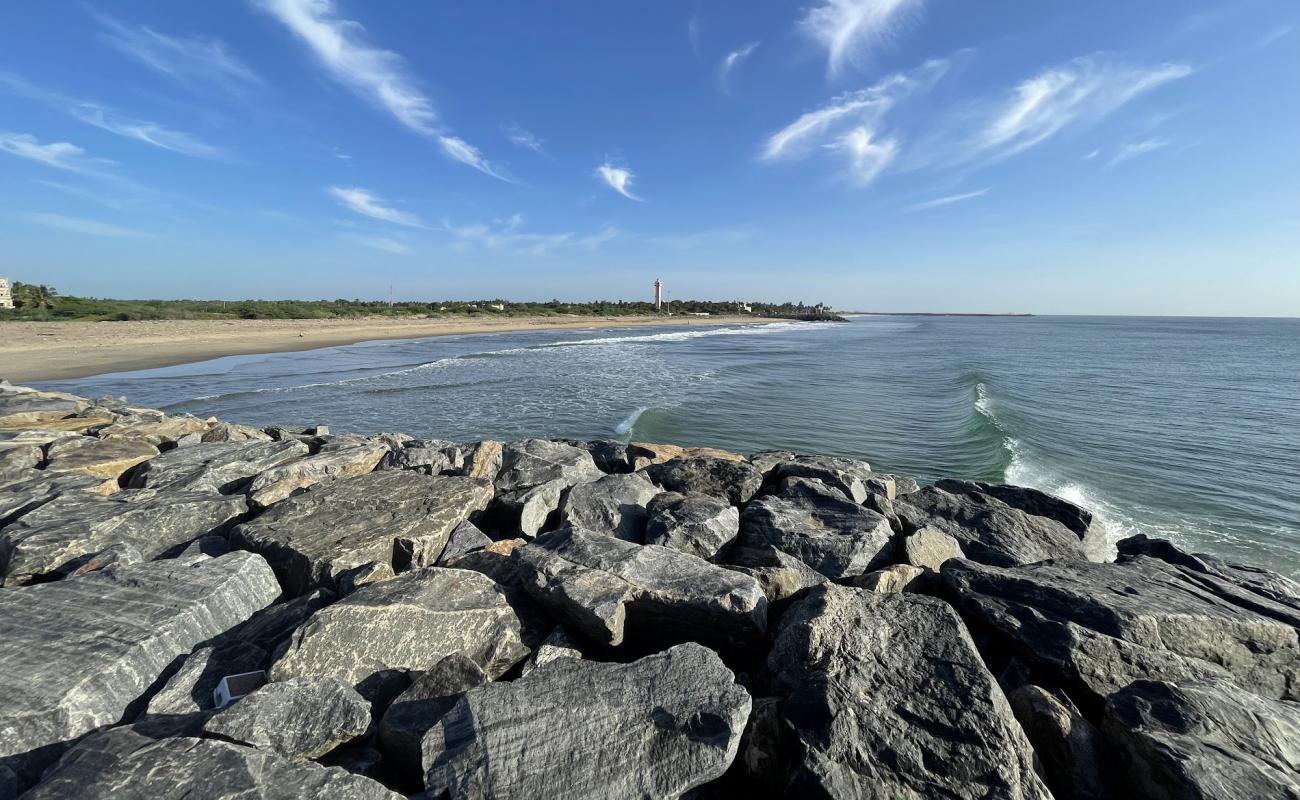 Фото Poompuhar Beach с золотистый песок поверхностью