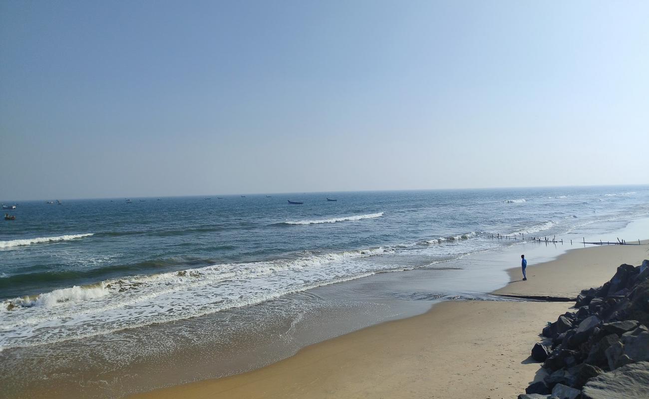 Фото Konapapapeta Beach с светлый песок поверхностью