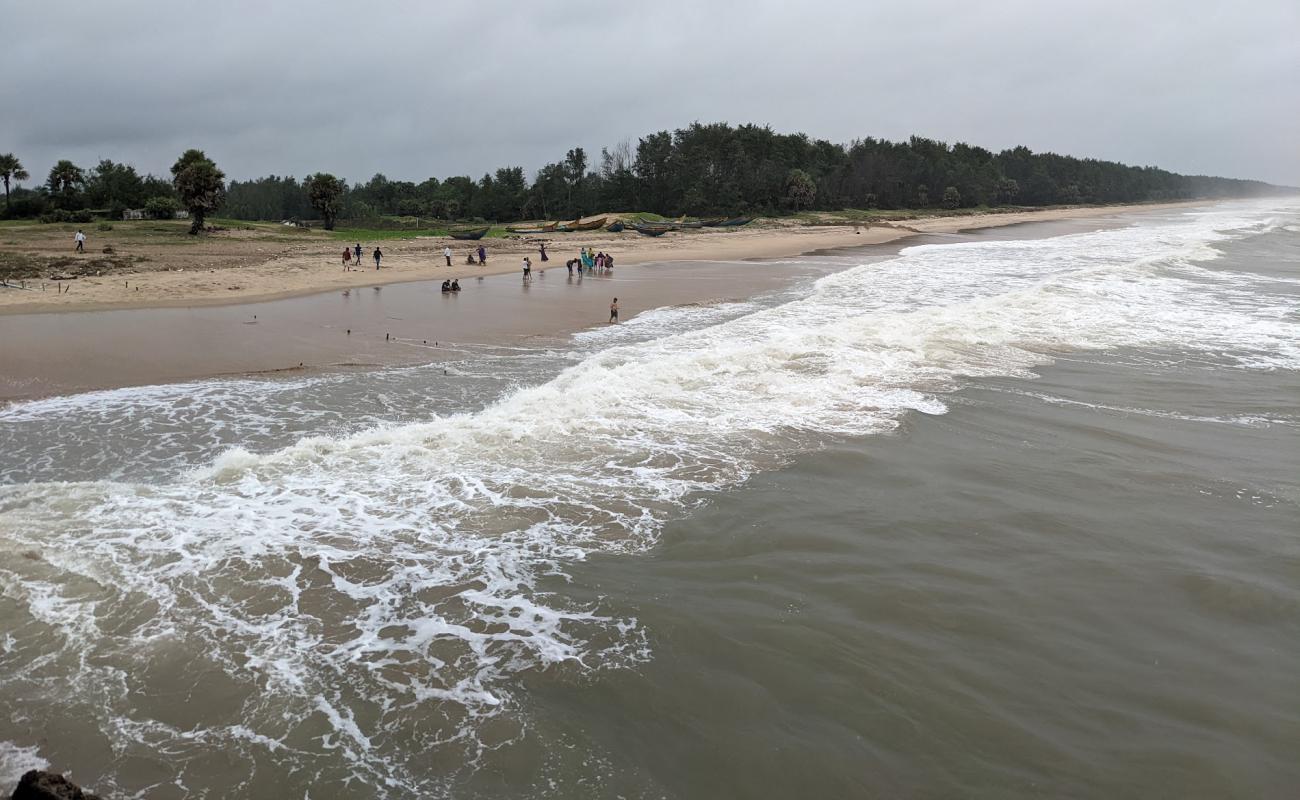 Фото Addaripeta Beach с светлый песок поверхностью