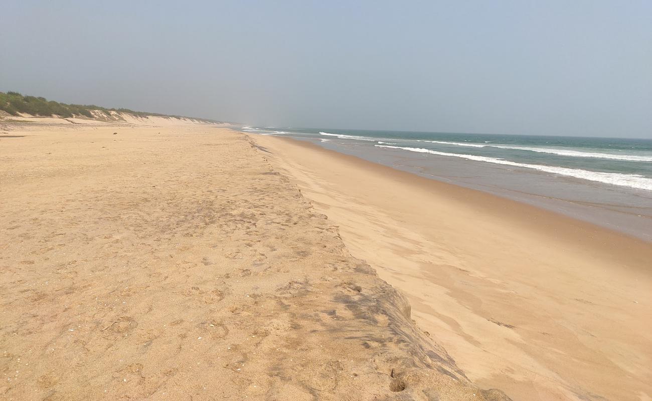 Фото Markandi Beach с светлый песок поверхностью