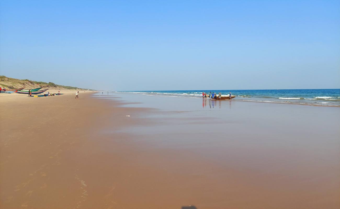 Фото Garampeta Beach с светлый песок поверхностью