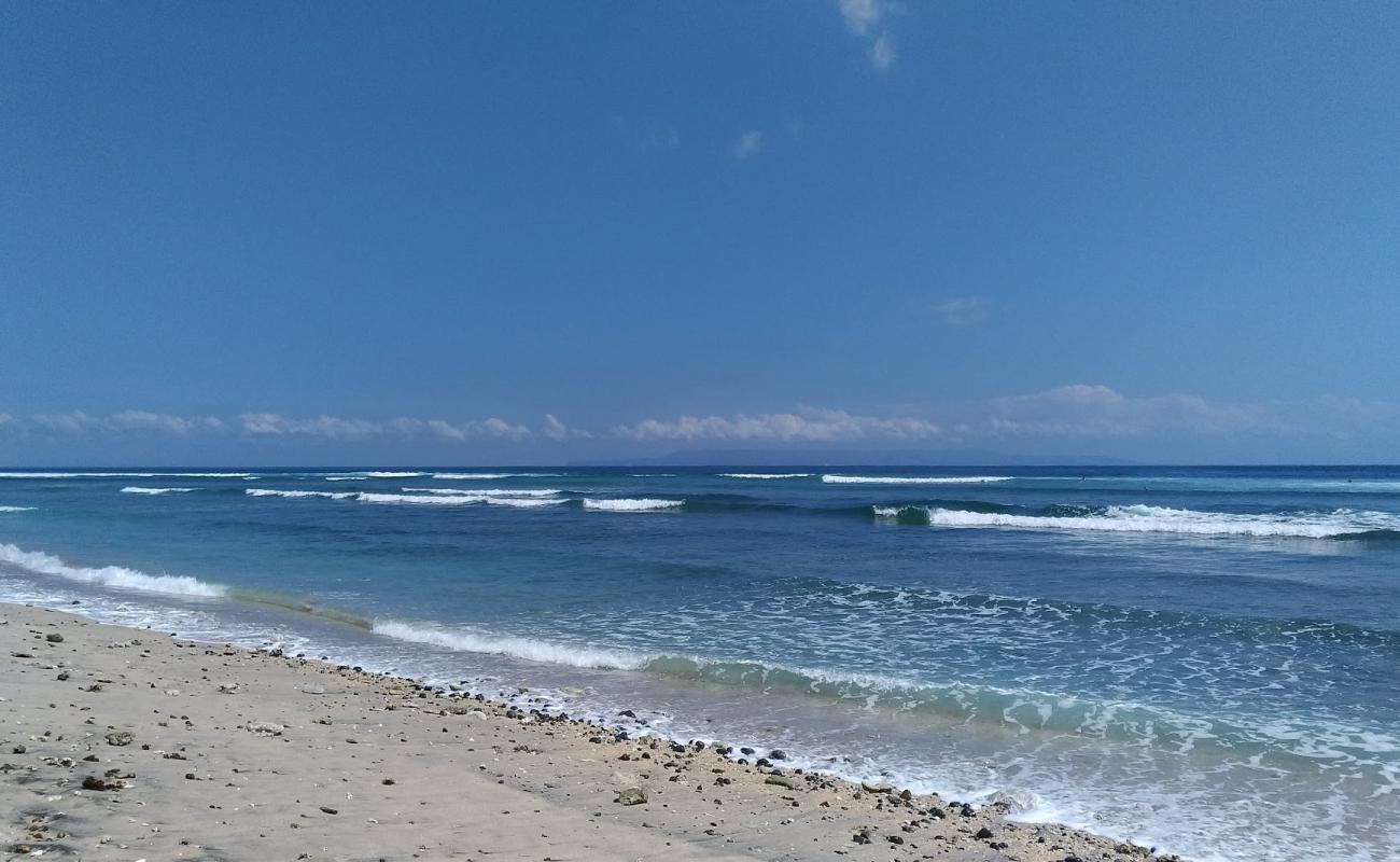 Фото Desert Point Beach с серый песок поверхностью