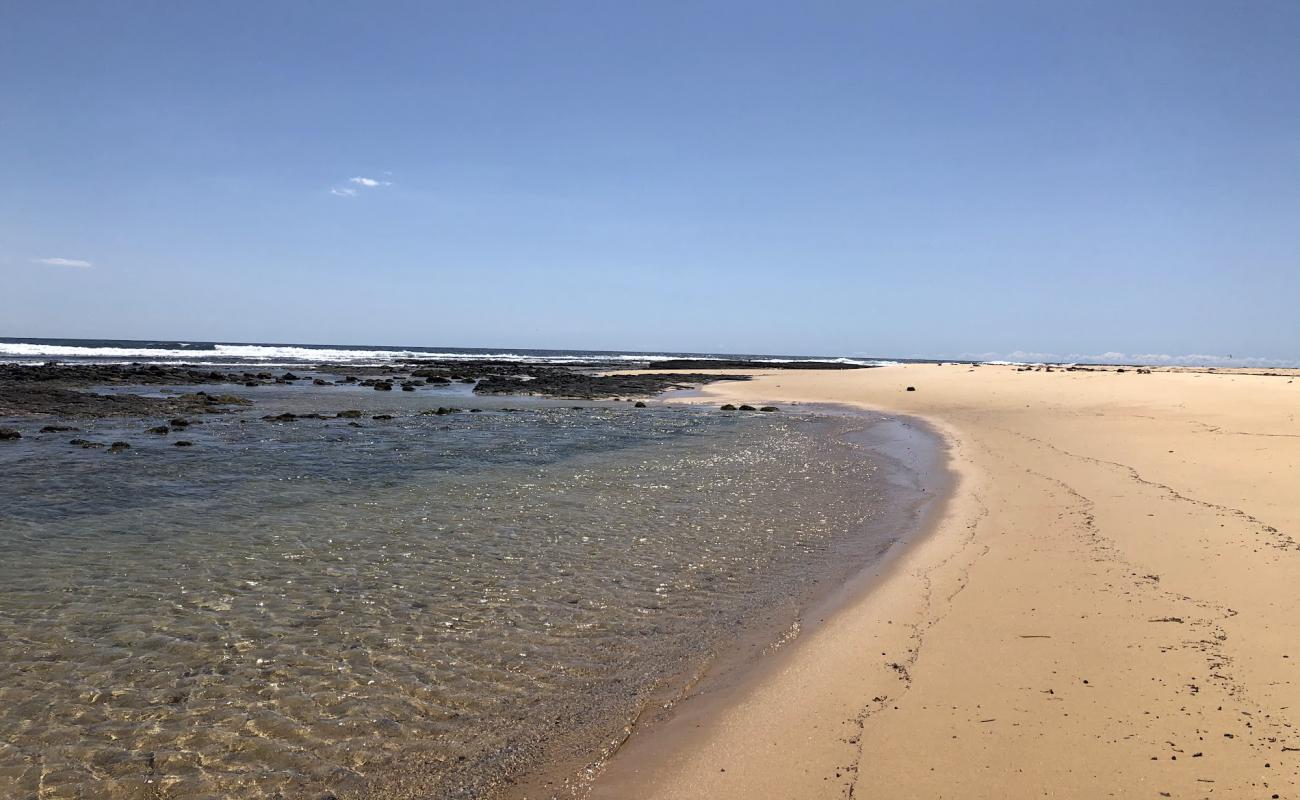 Фото Meringo Beach с светлый песок поверхностью