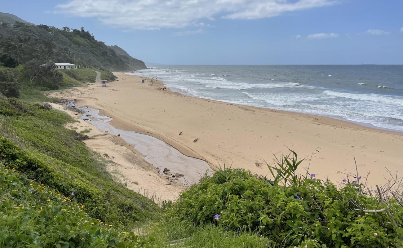 Фото Scarborough Beach с светлый песок поверхностью