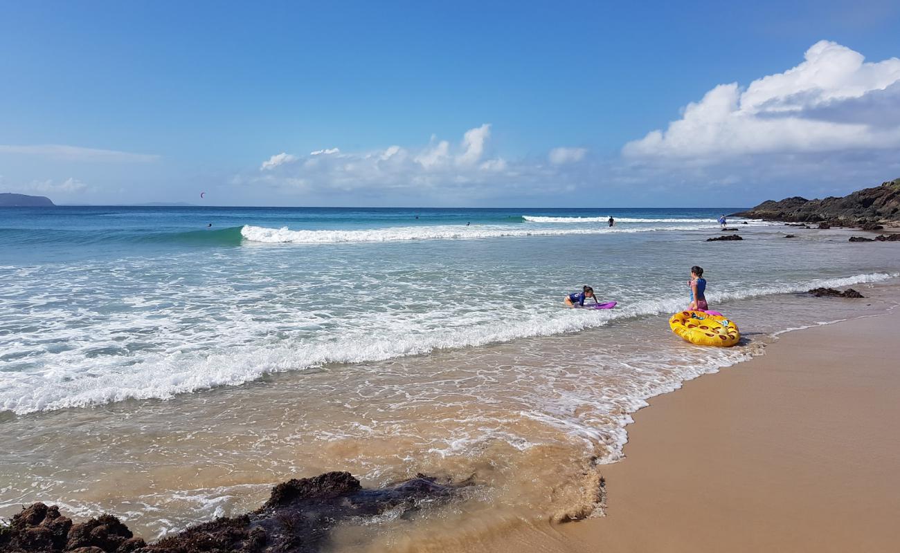 Фото Goolawah Beach с золотистый песок поверхностью