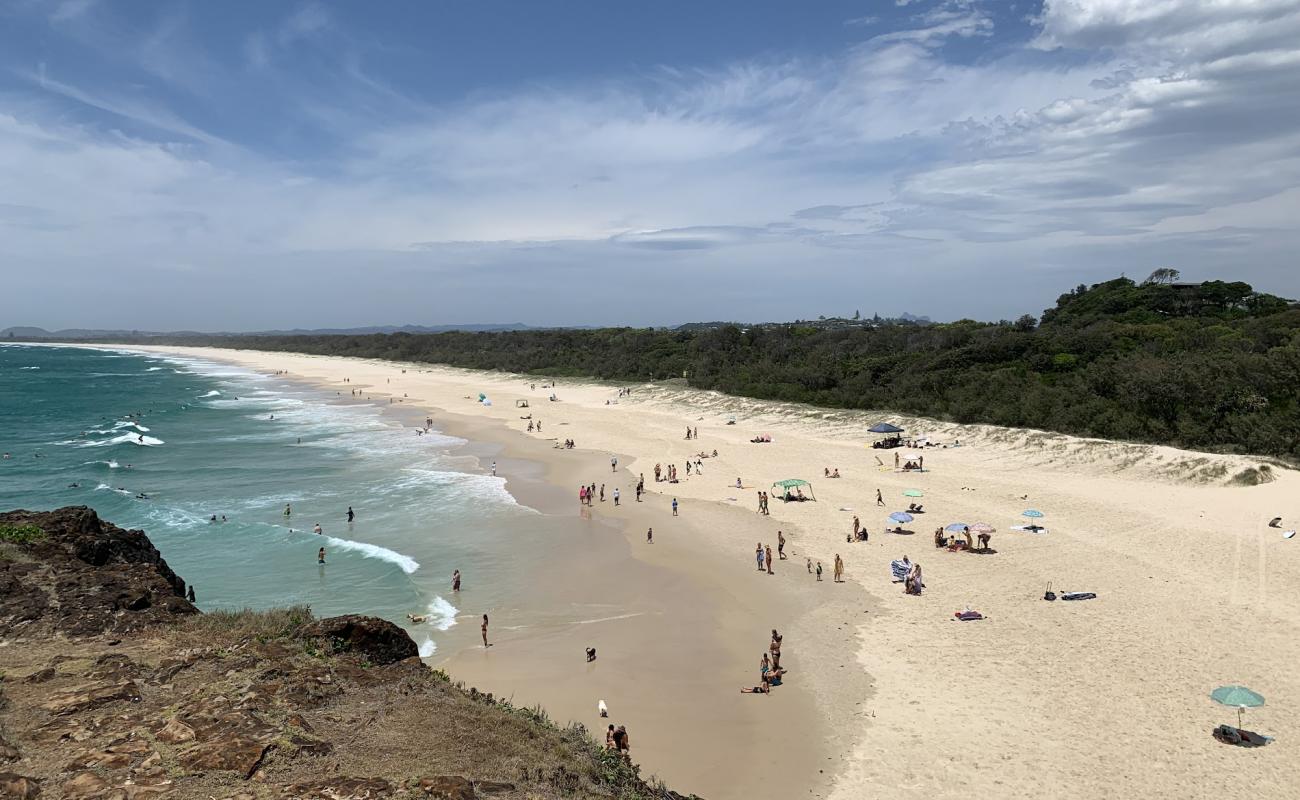 Фото Dreamtime Beach с золотистый песок поверхностью