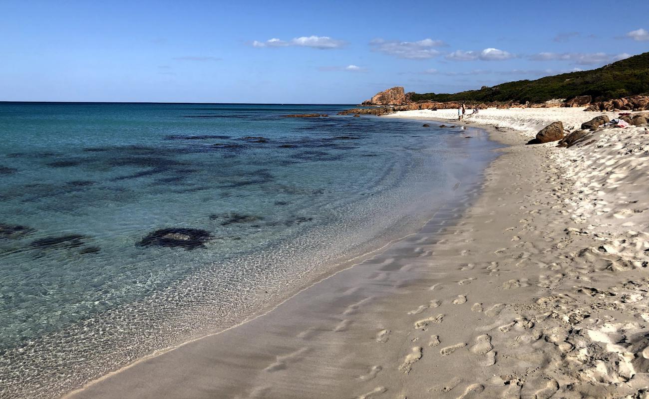 Фото Castle Rock Beach с светлый песок поверхностью