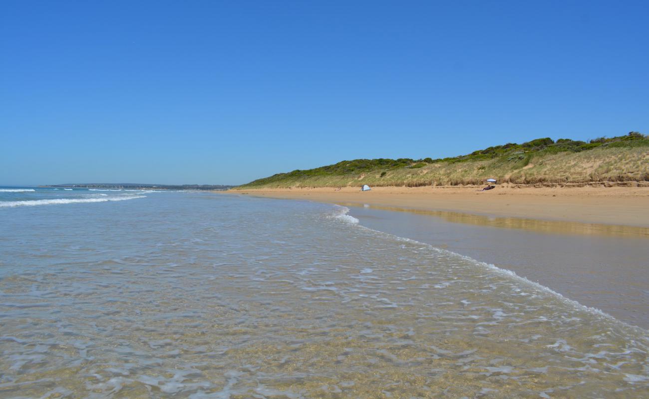 Фото Point Impossible Beach с светлый песок поверхностью