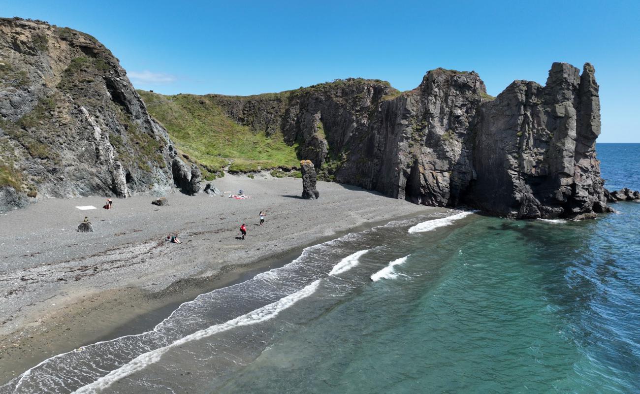 Фото Tra na Mbo Beach с песок с галькой поверхностью