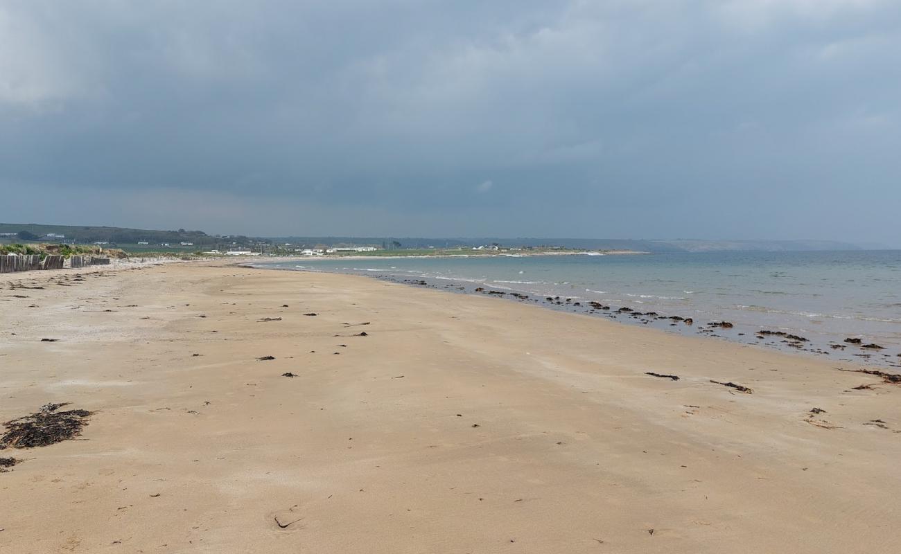 Фото Crushea Bay Beach с светлый песок поверхностью