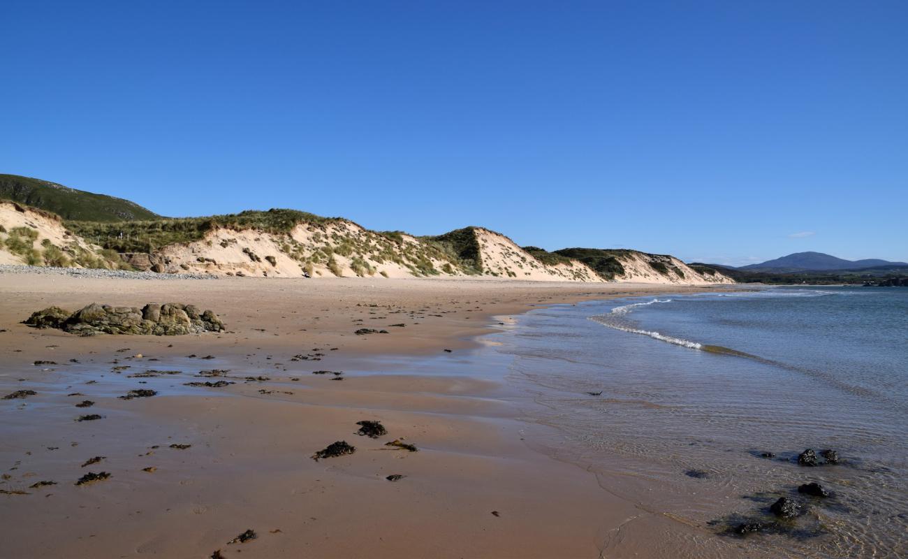 Фото Five finger Beach с светлый песок поверхностью