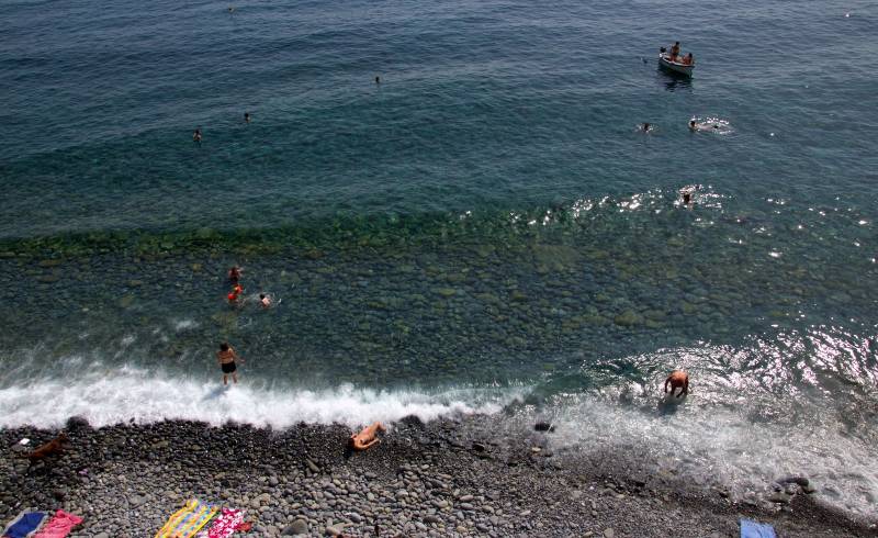 Фото Spiaggione di Corniglia с камни поверхностью