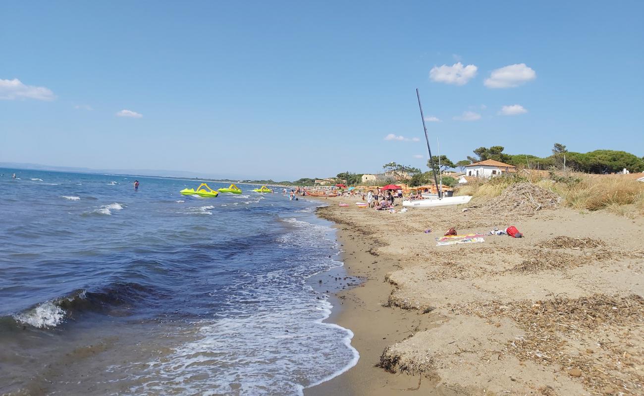 Фото Spiaggia di St.Liberata с песок с галькой поверхностью