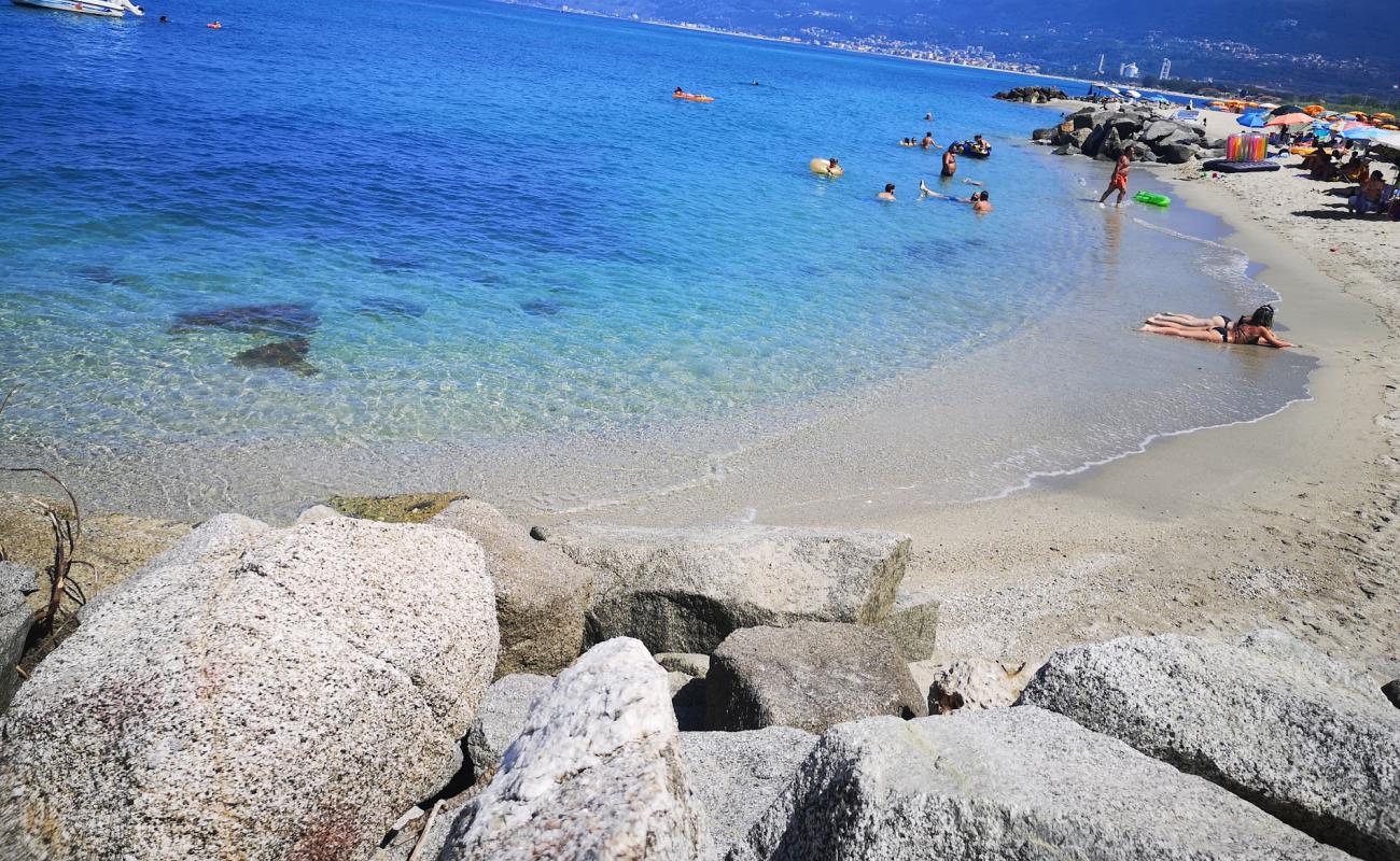 Фото Spiaggia di Trainiti с светлый песок поверхностью