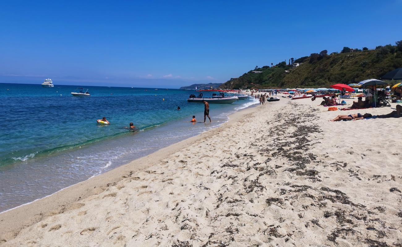 Фото Spiaggia di Vardano с светлый песок поверхностью